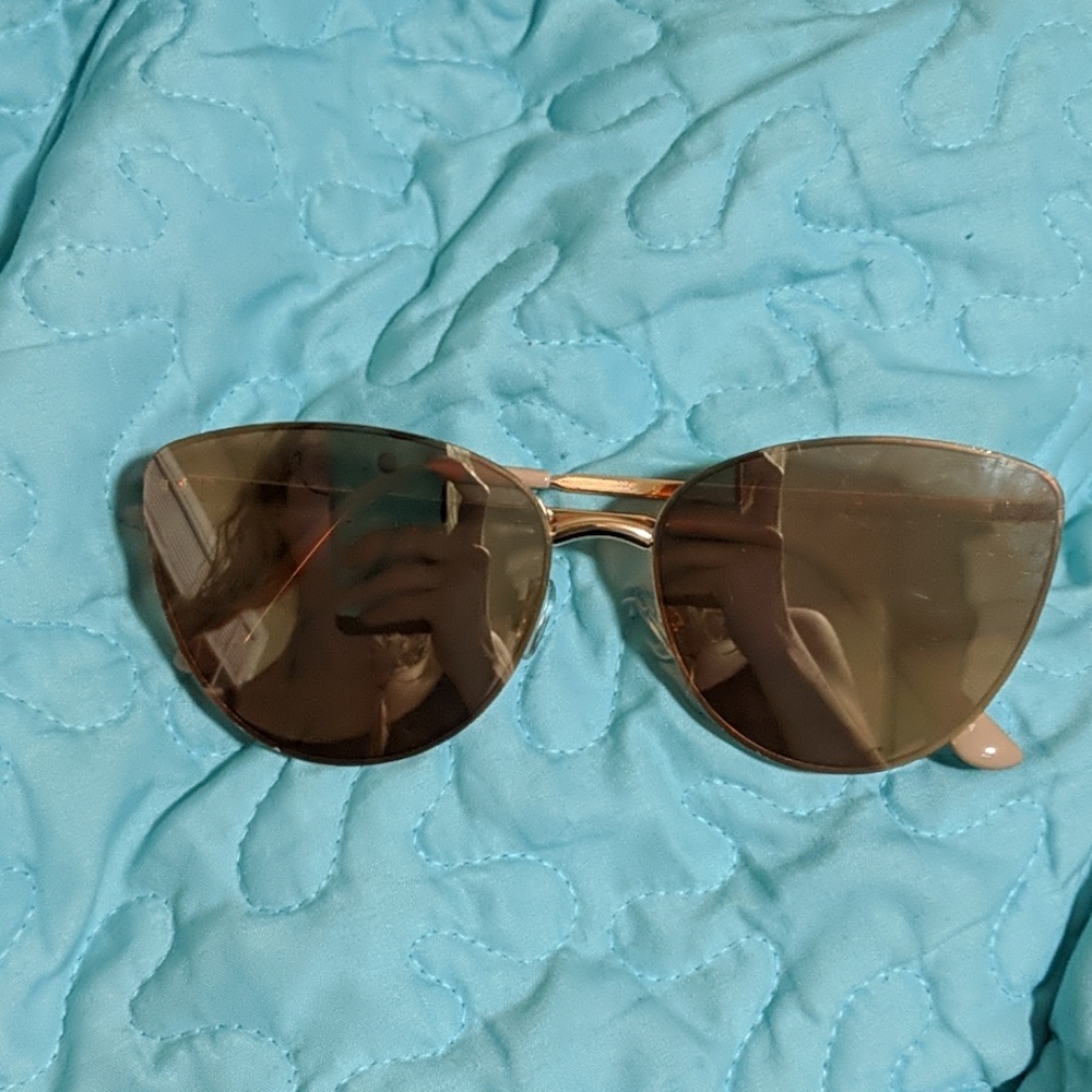 Reflective sunglasses.
